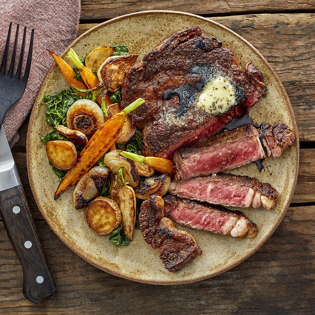 12oz. Pan-Seared Ribeye Steaks with Balsamic Reduction & Roasted Root Vegetables